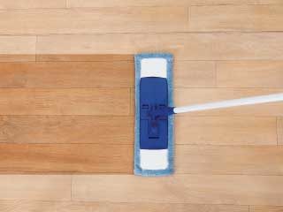 swiffer style mop cleaning light brown floors